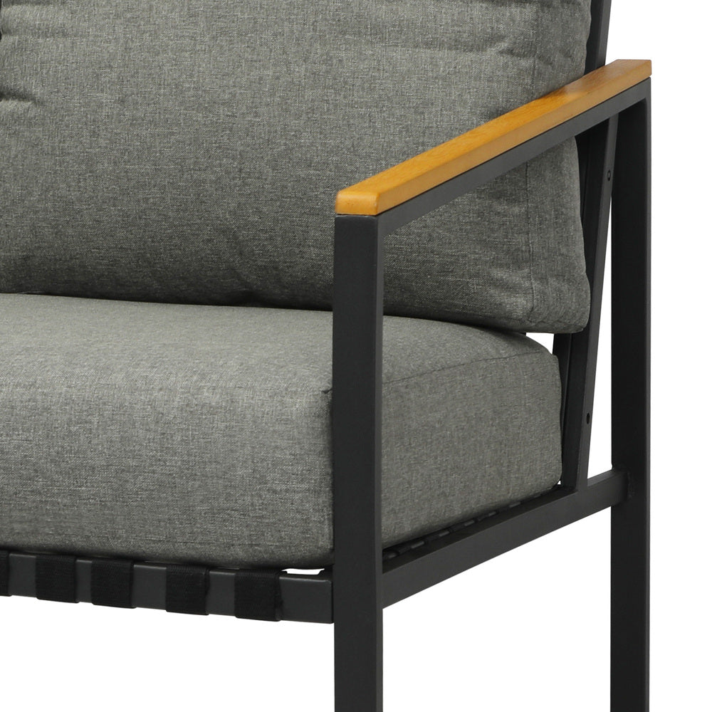 Black Outdoor Patio Set with Table and Cushioned Chairs